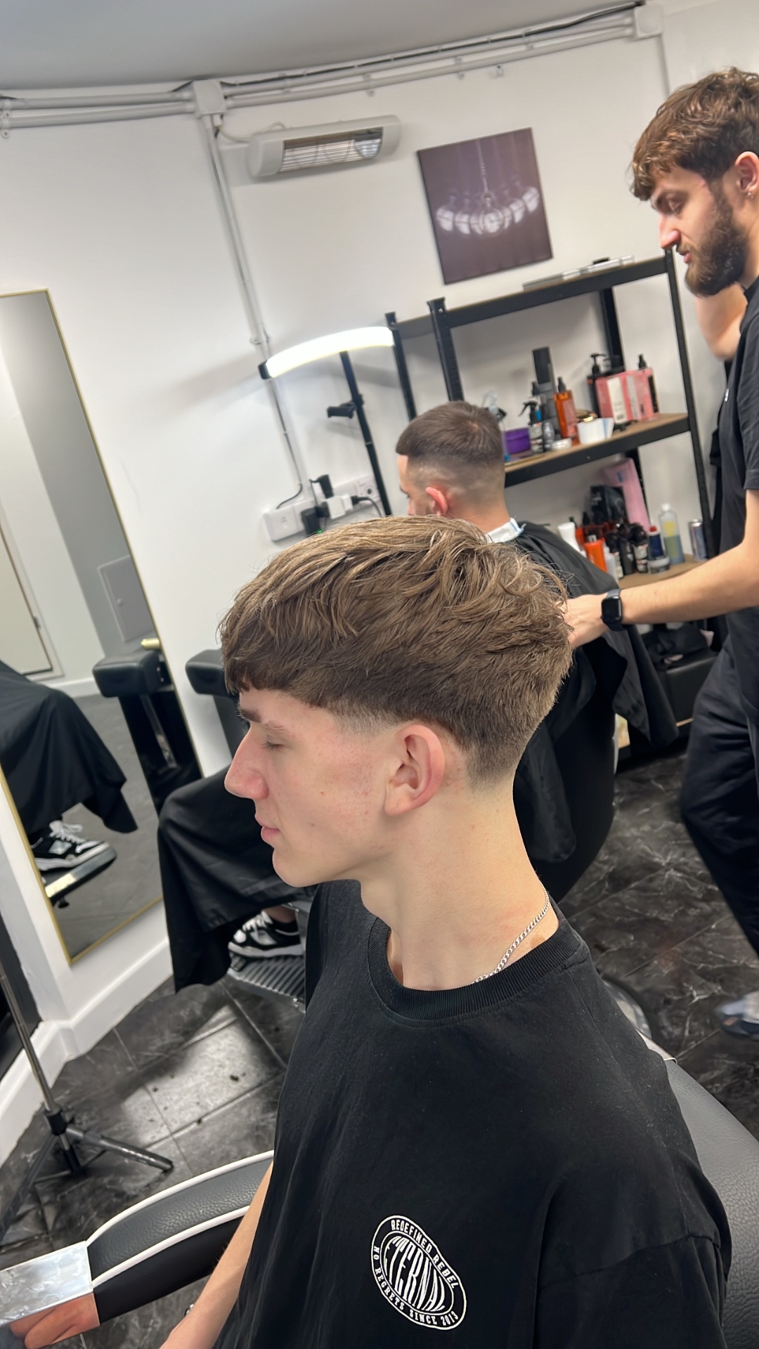 Neat short haircut with a soft fringe